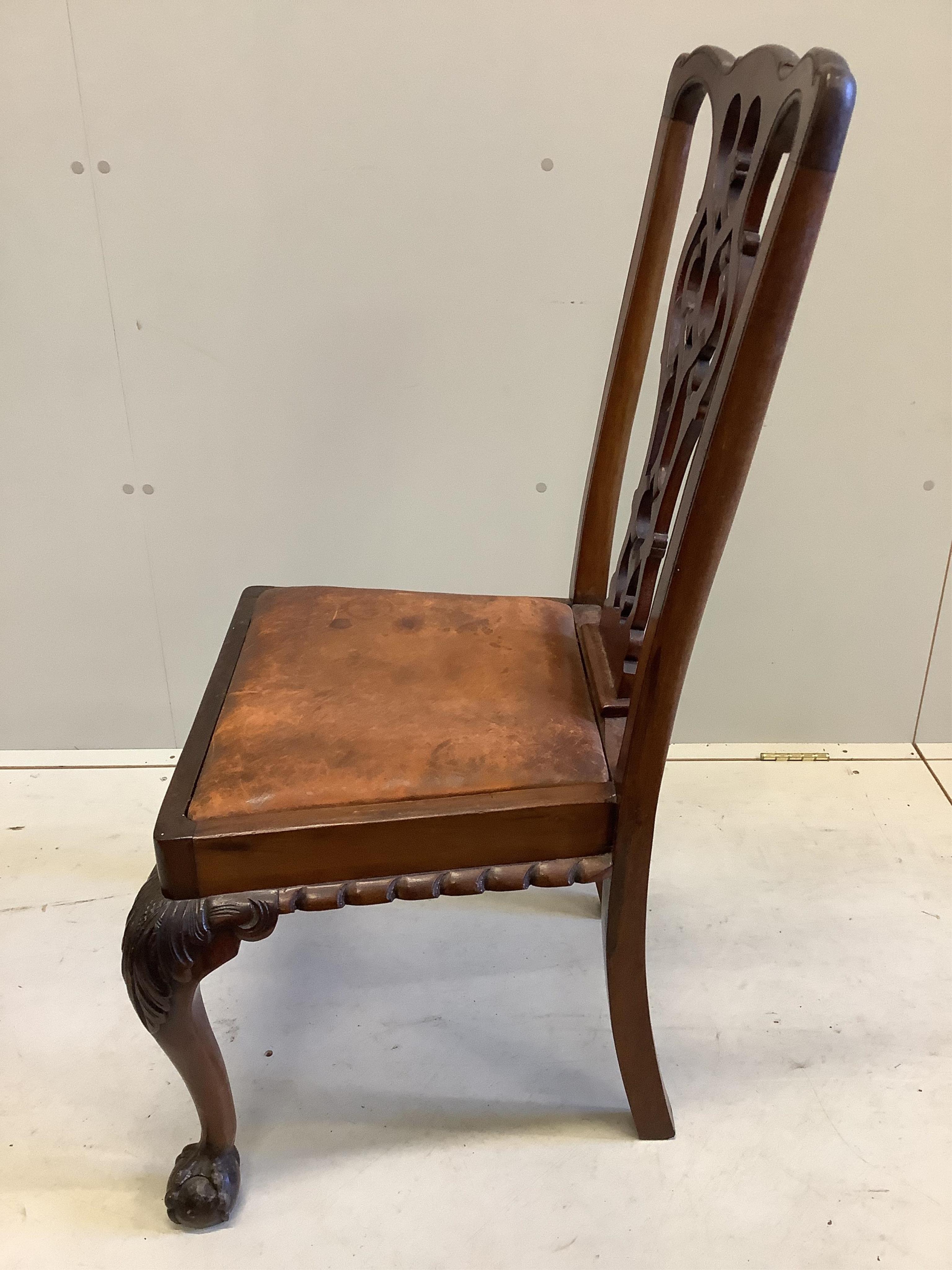 A Chippendale Revival rectangular mahogany table, width 152cm, depth 96cm, height 78cm and four chairs. Condition - fair